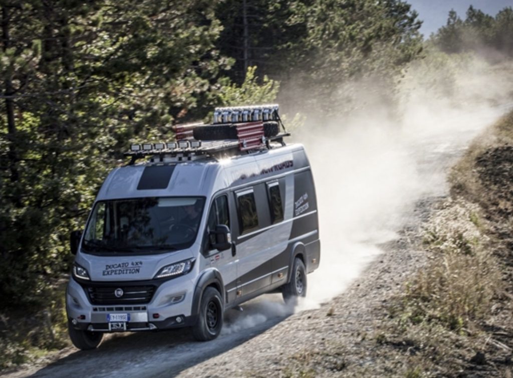 Fiat Ducato camper going down dirt road