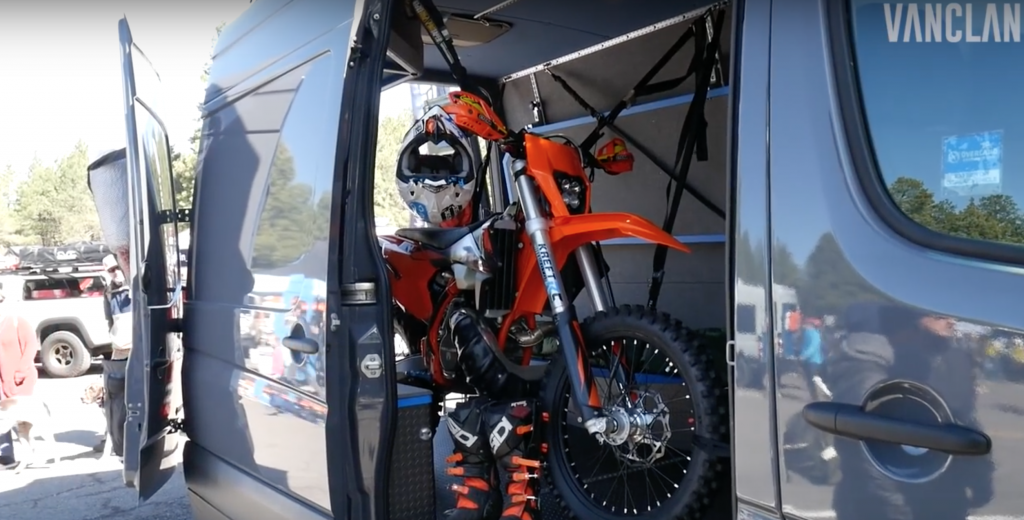 Dirt bike stored inside Outside Van campers