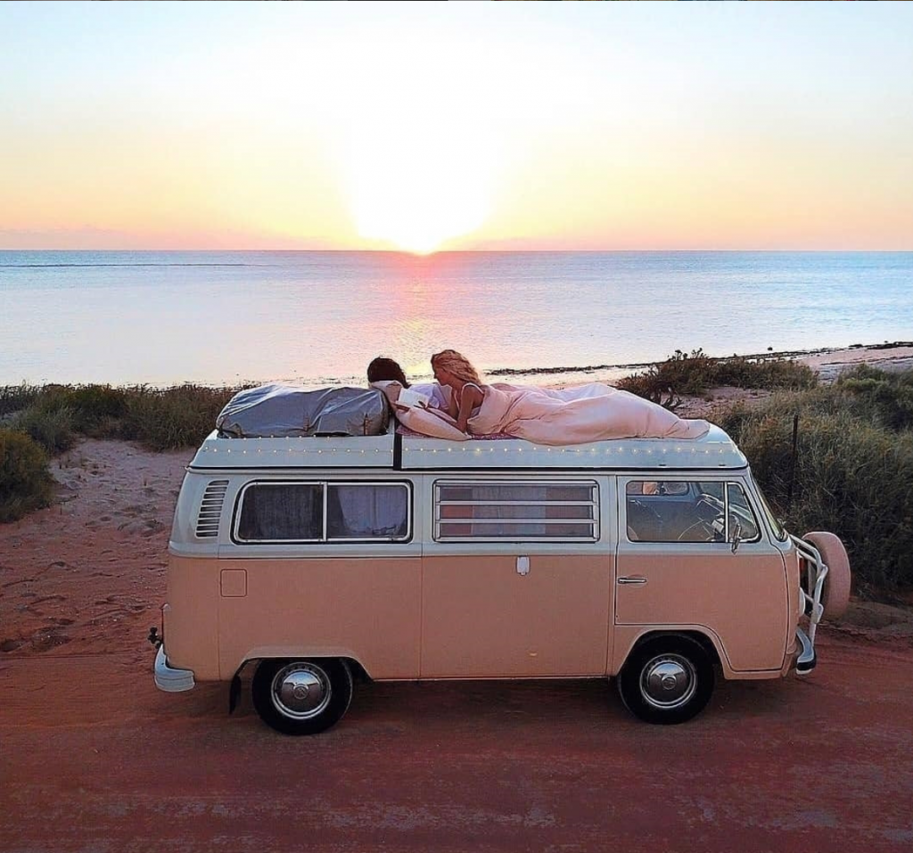 travel in a van - pink VW