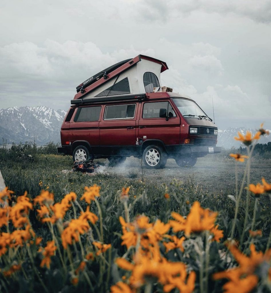 Pop up camper - VW red pop top in flowers