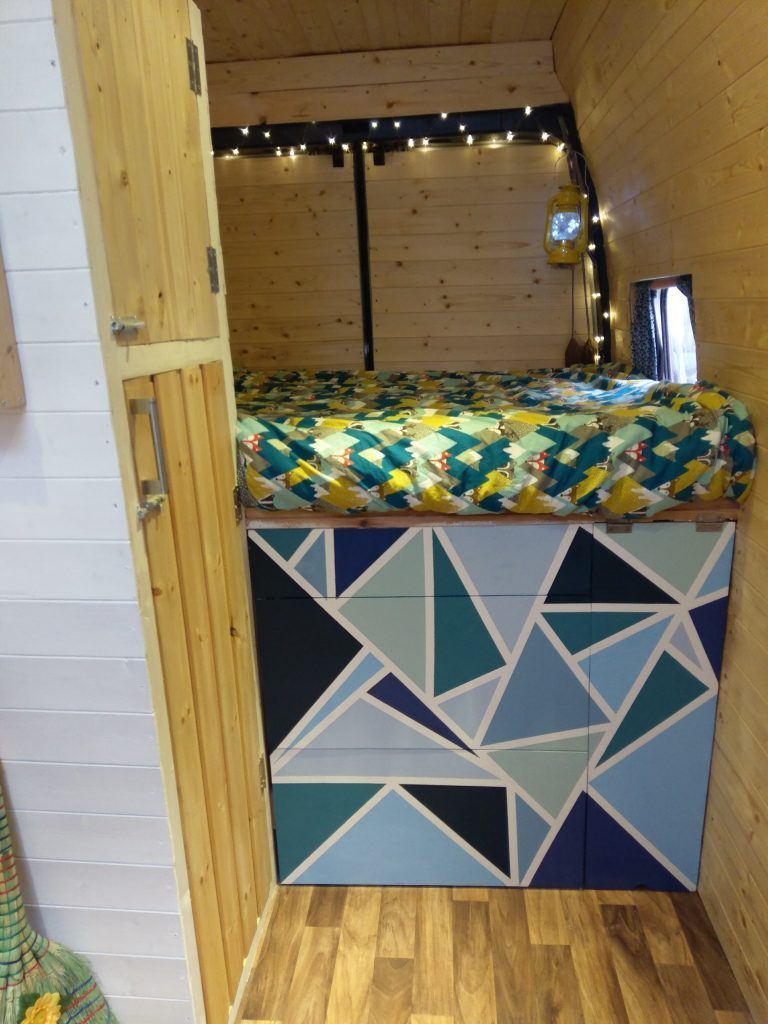 Drawers in van and fairy lights.