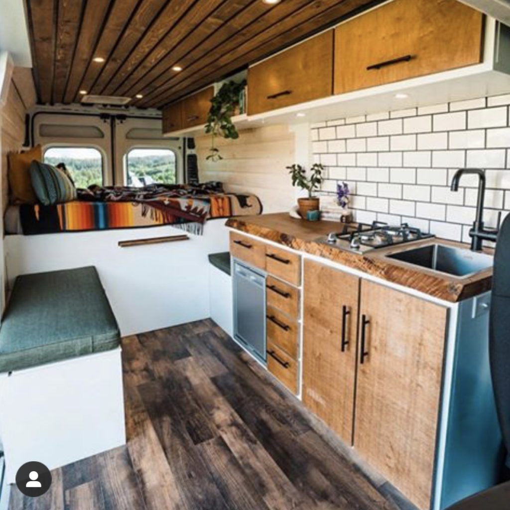 Sprinter van conversion interior, best camper van gear, mattress.