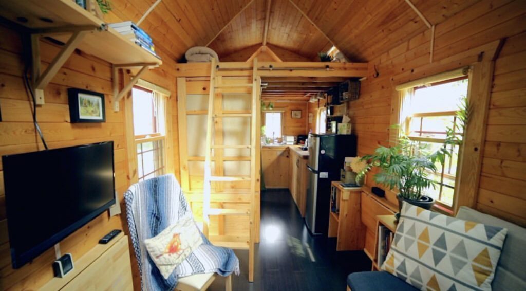Wooden interior of tiny home.