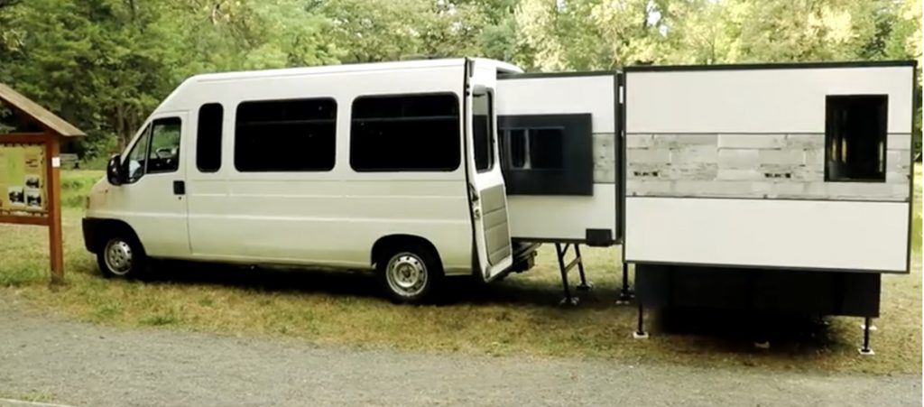 IoCamper coming out of the back of van.