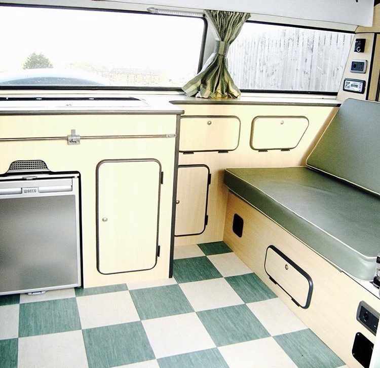 Mint green vintage interior of VW campervan.