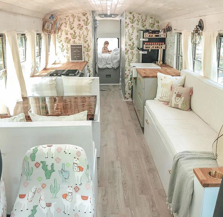 White and green bus interior with cacti wallpaper