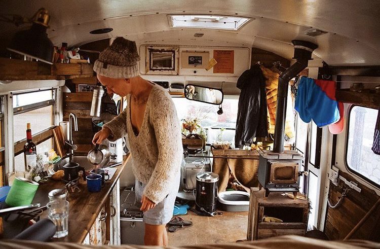 School bus conversions, making coffee in bus.