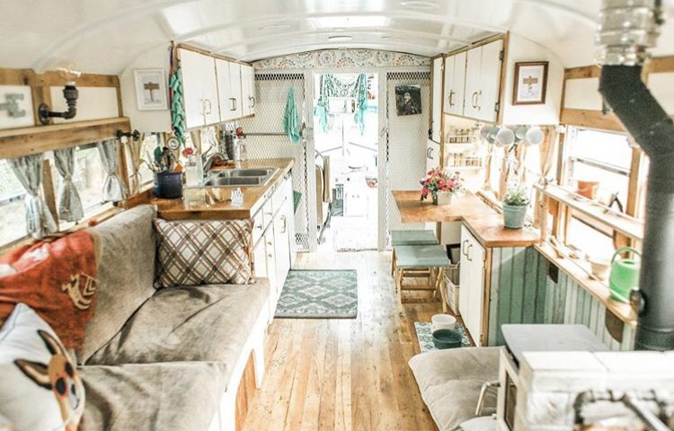 Interior of bus conversion, white and green.