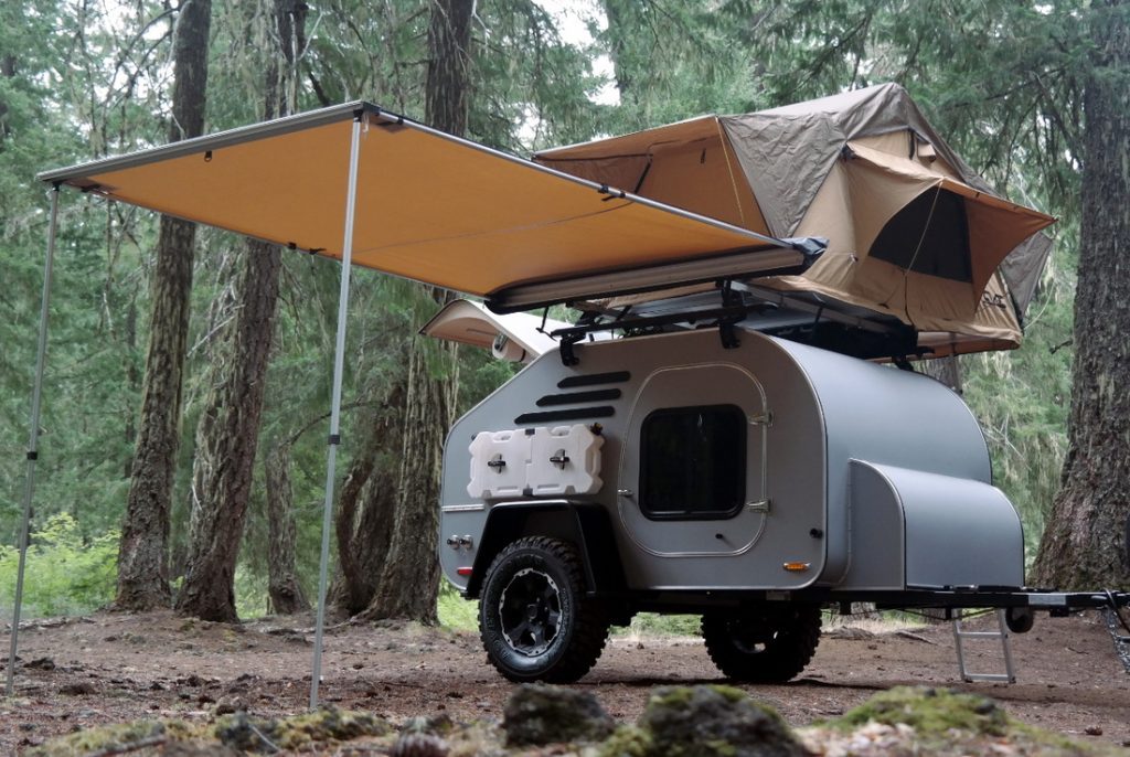 Best teardrop campers - the TerraDrop complete with roof tent and awning in a forest setting