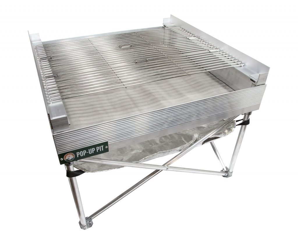 portable fire pit complete with grill attachment and heat shield