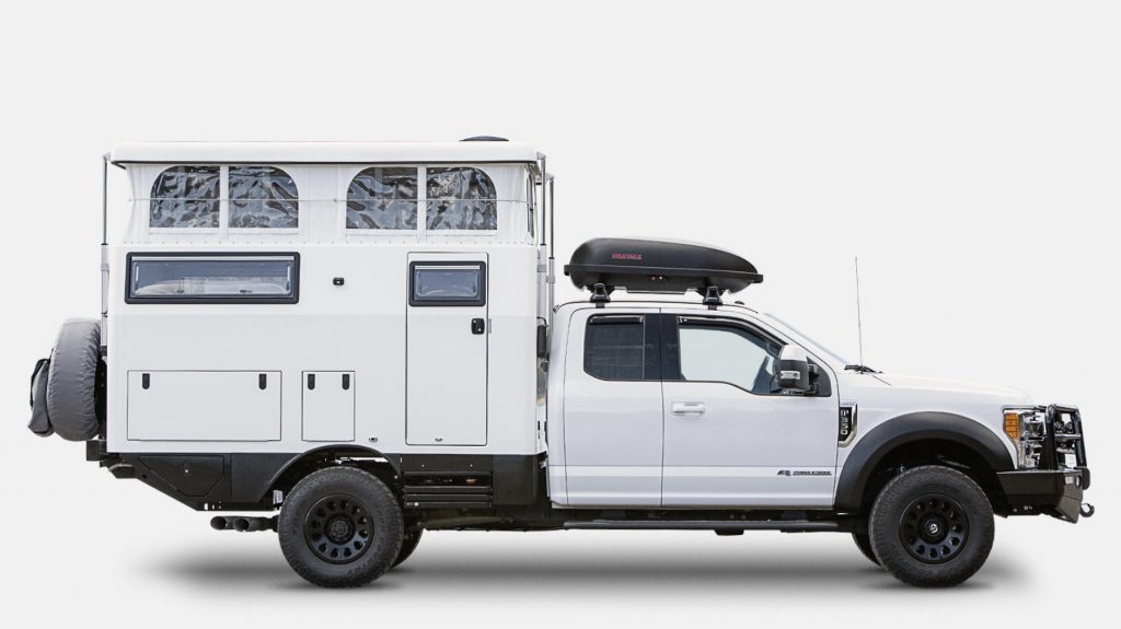Side view of EarthCruiser EXD with roof popped up