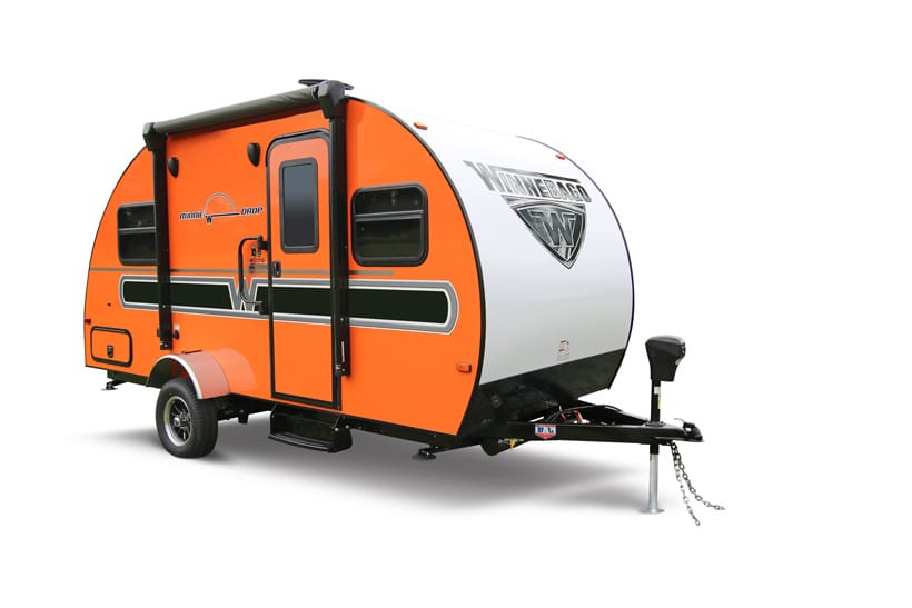 Best teardrop campers - The Minnie Drop from Winnebago with a vibrant orange side panel and company logo graphic on the curve.