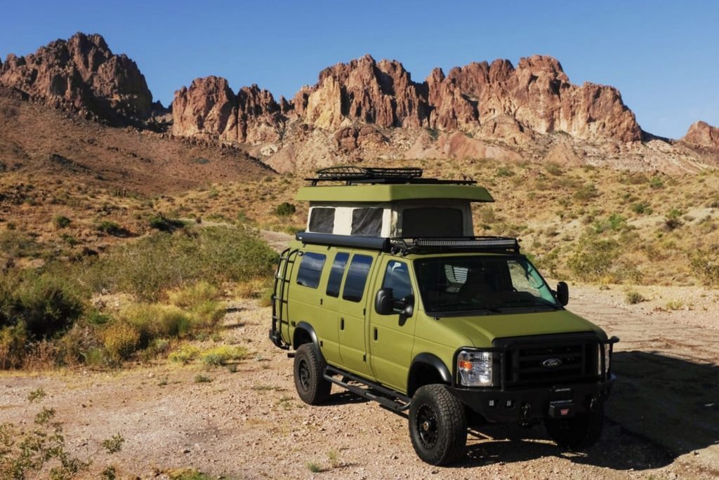 Best RV - green Sportsmobile exterior with pop top up