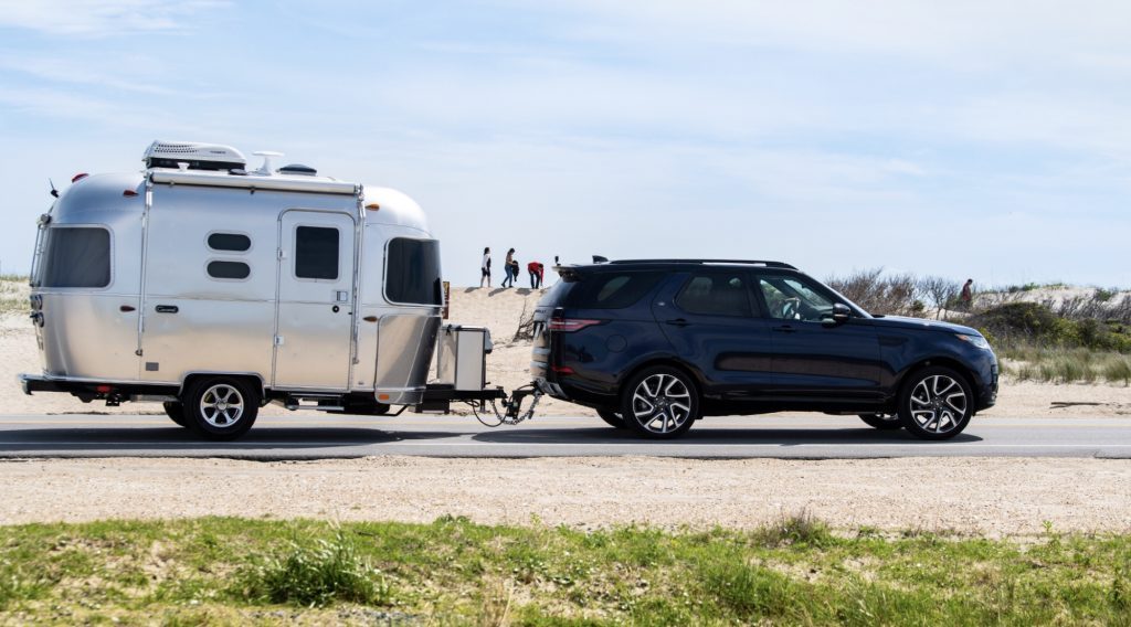 Best RV - exterior of Airstream Caravel attached to a car