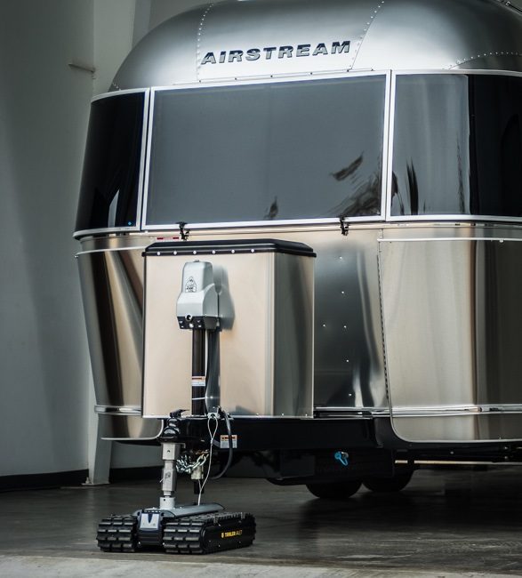 best trailer accessories - a silver robot with caterpillar treads that can move your trailer