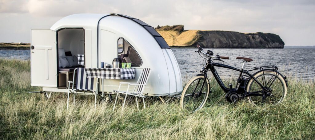 Crazy campervans - bike camper exterior next to bike