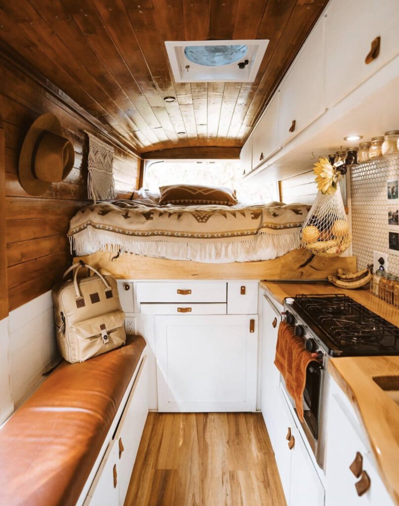 white and wooden cmapervan interior