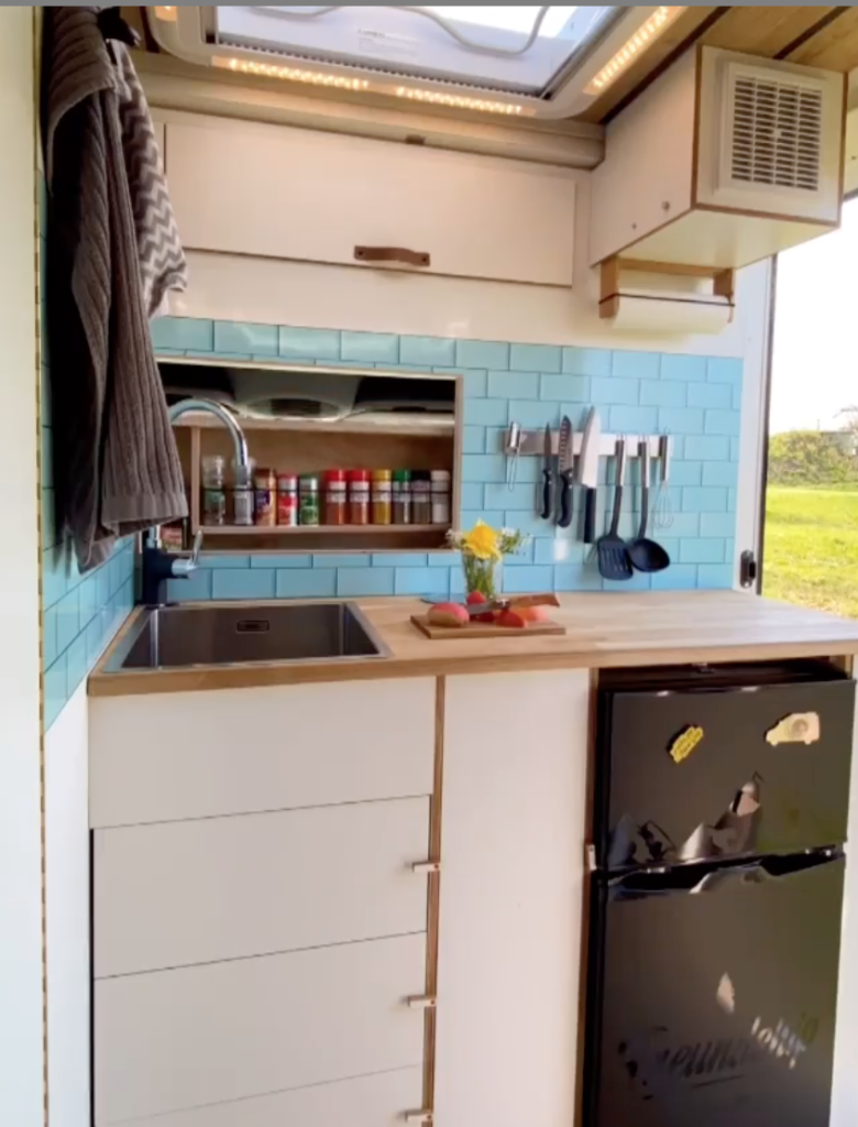 Motorised spice rack in a van