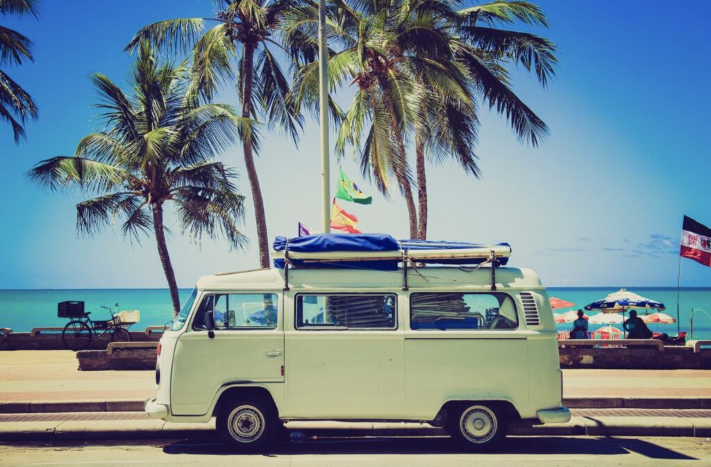 VW camper on sunny beach