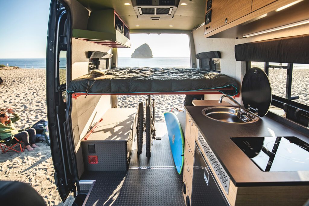 Bed in bed position in van