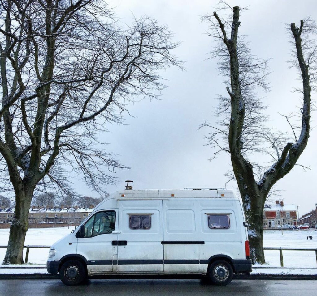 Van on a road in the snow