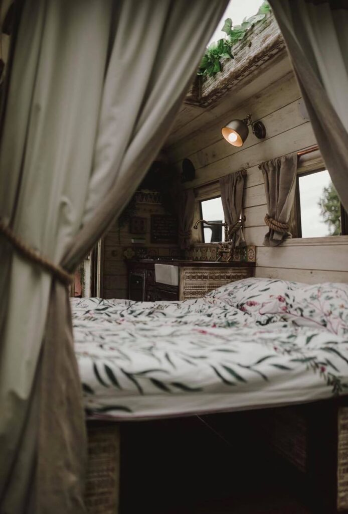 Bed converts from the sofa - Handcrafted Rustic Campervan
