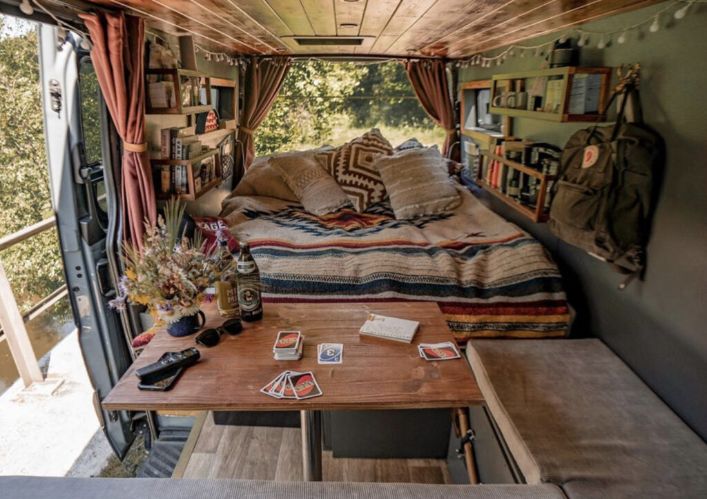 Conversion Vans - Fixed bed at back, seating and table at front